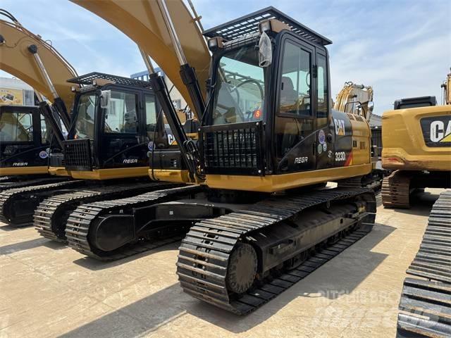 CAT 323 D L حفارات زحافة