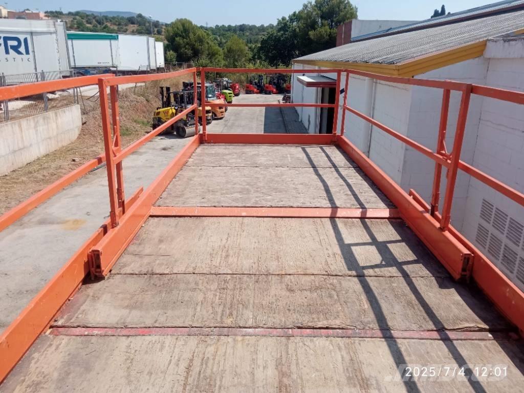 JLG 203-24 رافعات مقصية الشكل