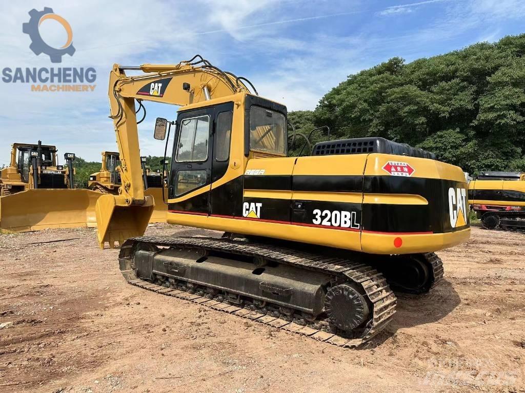 CAT 320 B L حفارات زحافة