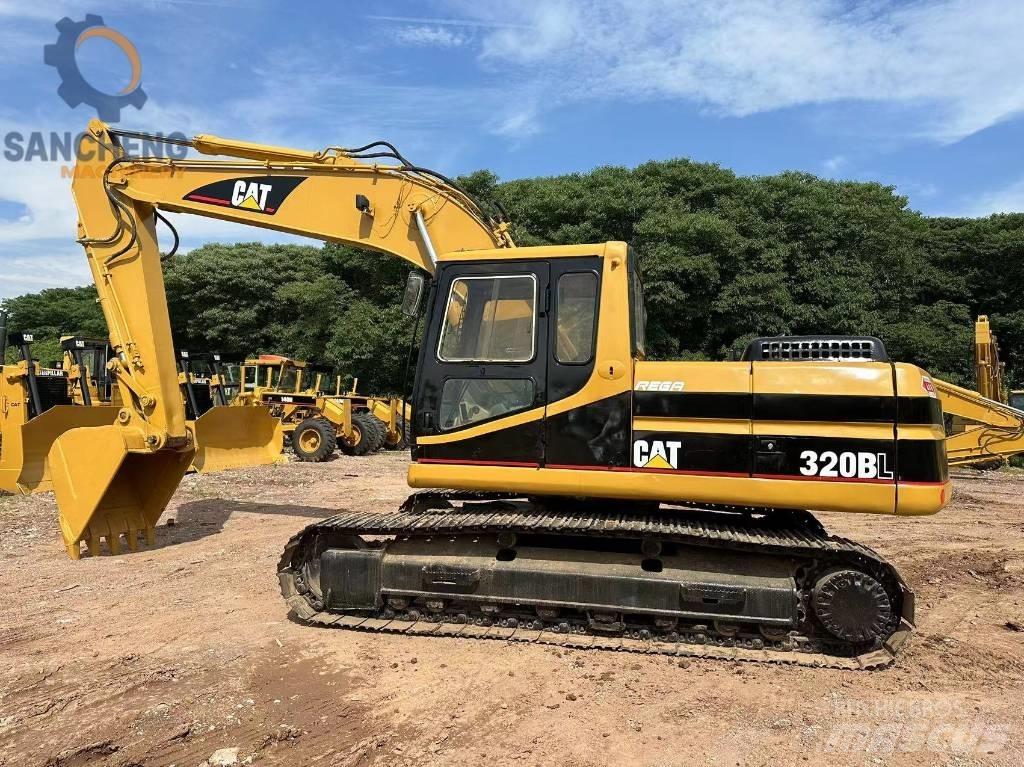 CAT 320 B L حفارات زحافة