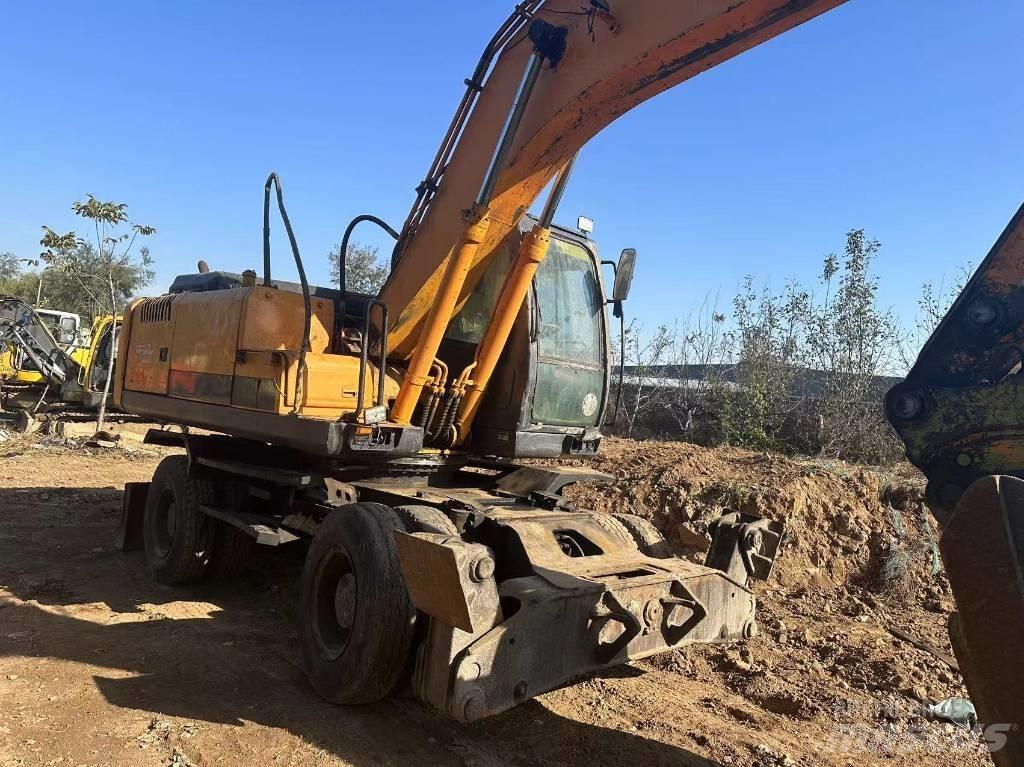 Hyundai R210W-9 حفارات بعجل