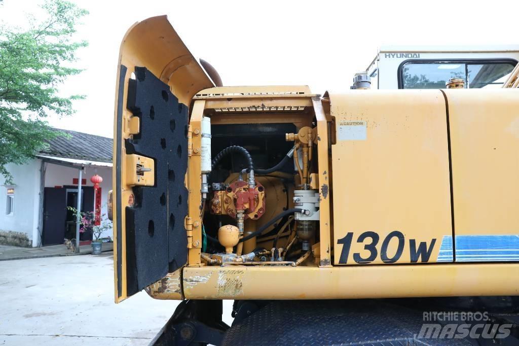Hyundai Robex 130 W حفارات بعجل