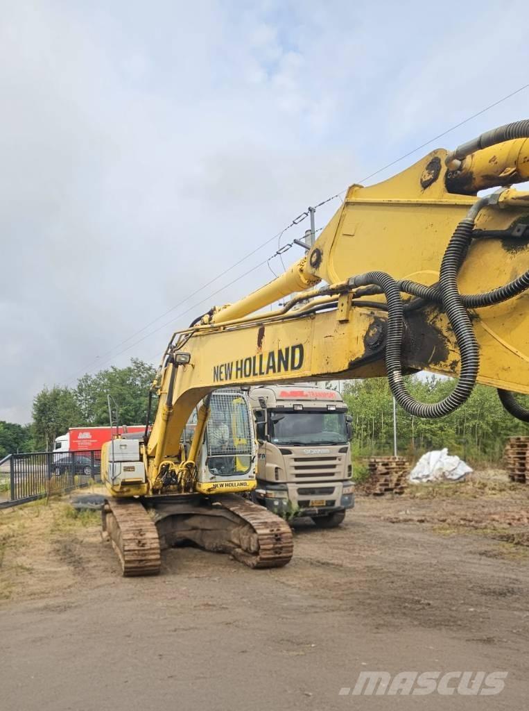 New Holland E 245 B حفارات زحافة