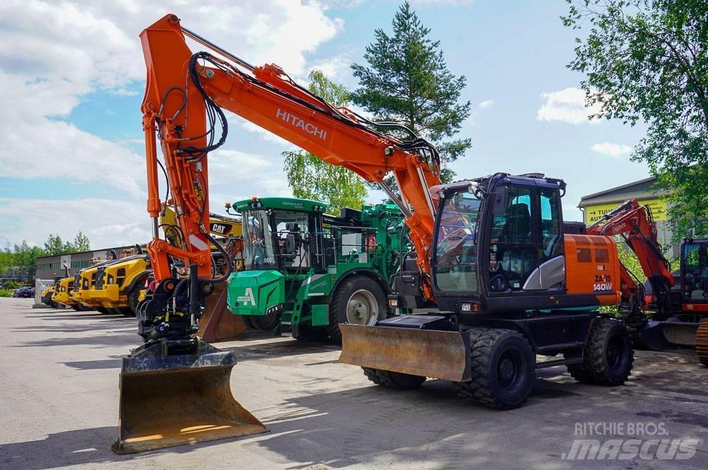 Hitachi ZX 140 W-6 حفارات بعجل