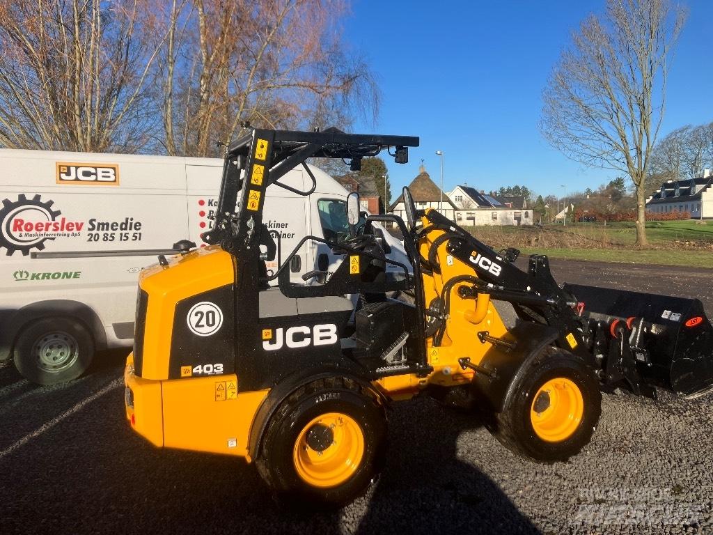 JCB 403 لوادر انزلاقية التوجيه