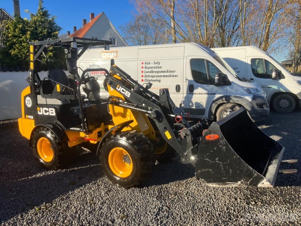 JCB 403 لوادر انزلاقية التوجيه