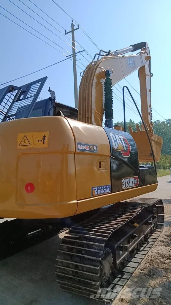 CAT 313 D حفارات بعجل