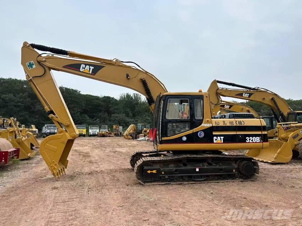 CAT 320BL حفارات زحافة