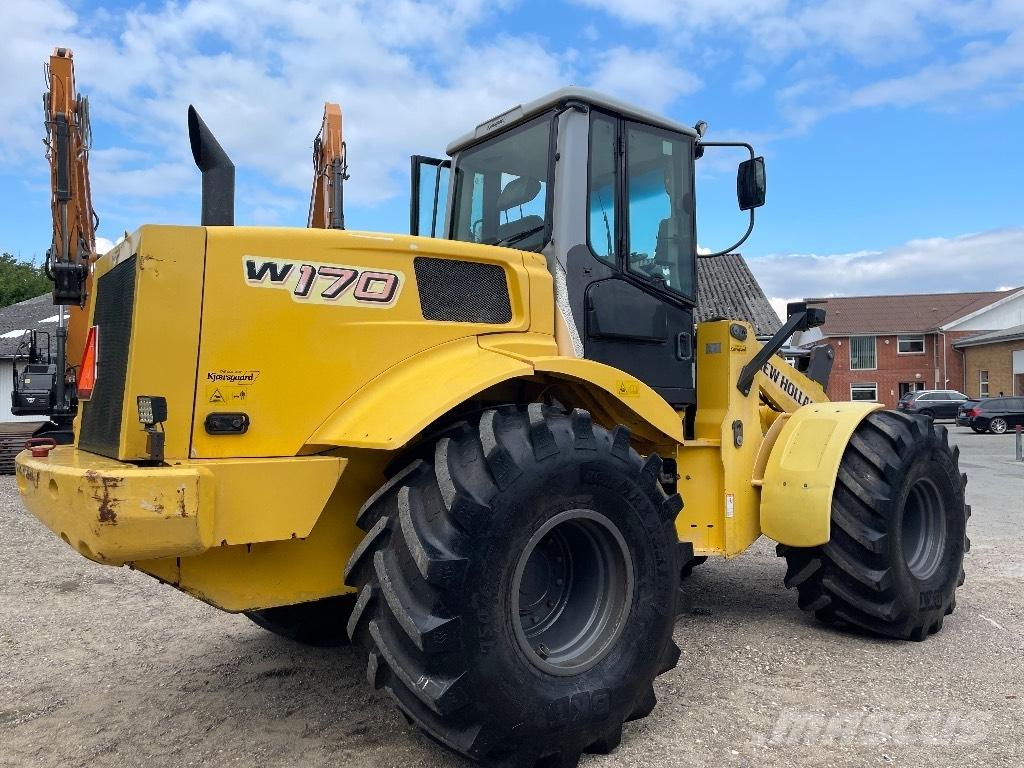 New Holland W 170 لوادر بعجل