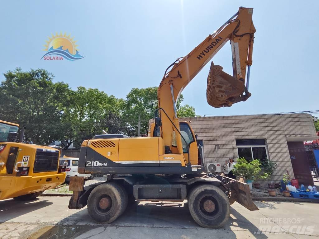 Hyundai R210W-9 حفارات بعجل