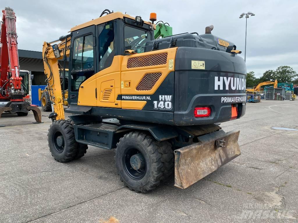 Hyundai HW140 حفارات بعجل