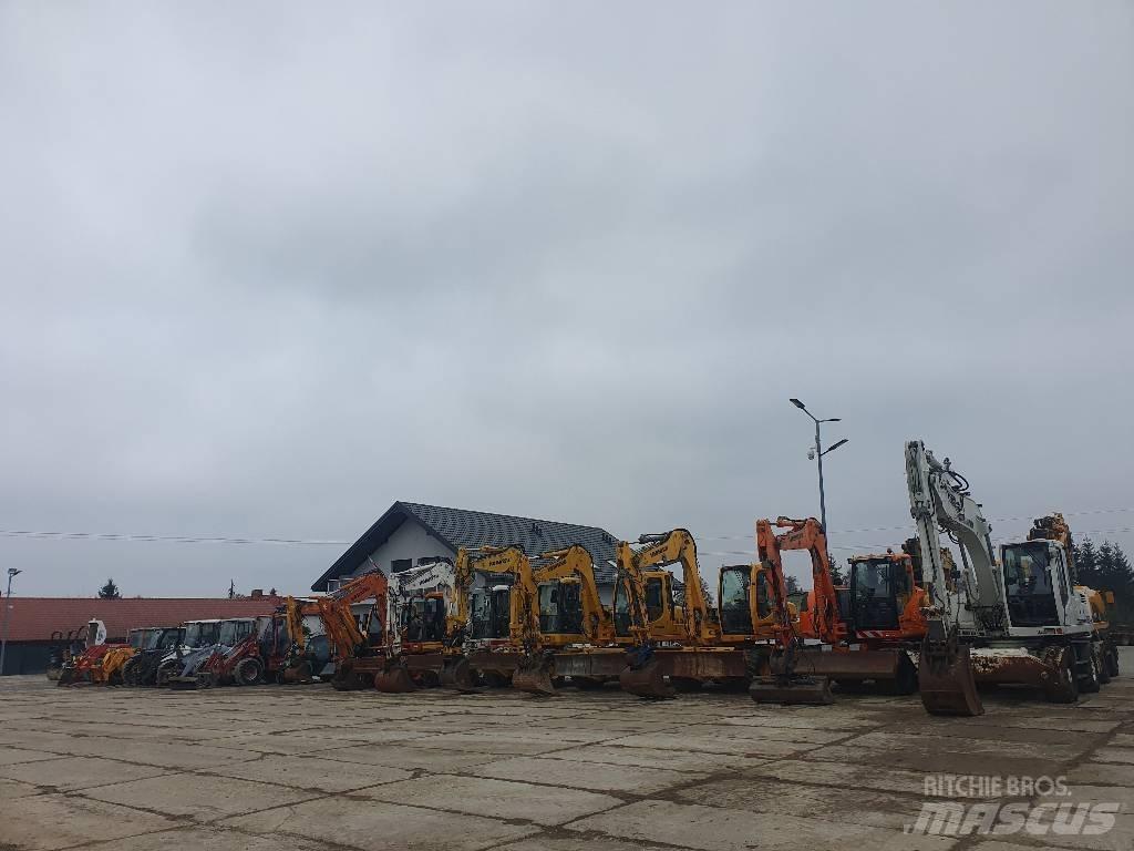 Mecalac 12 M TX حفارات بعجل