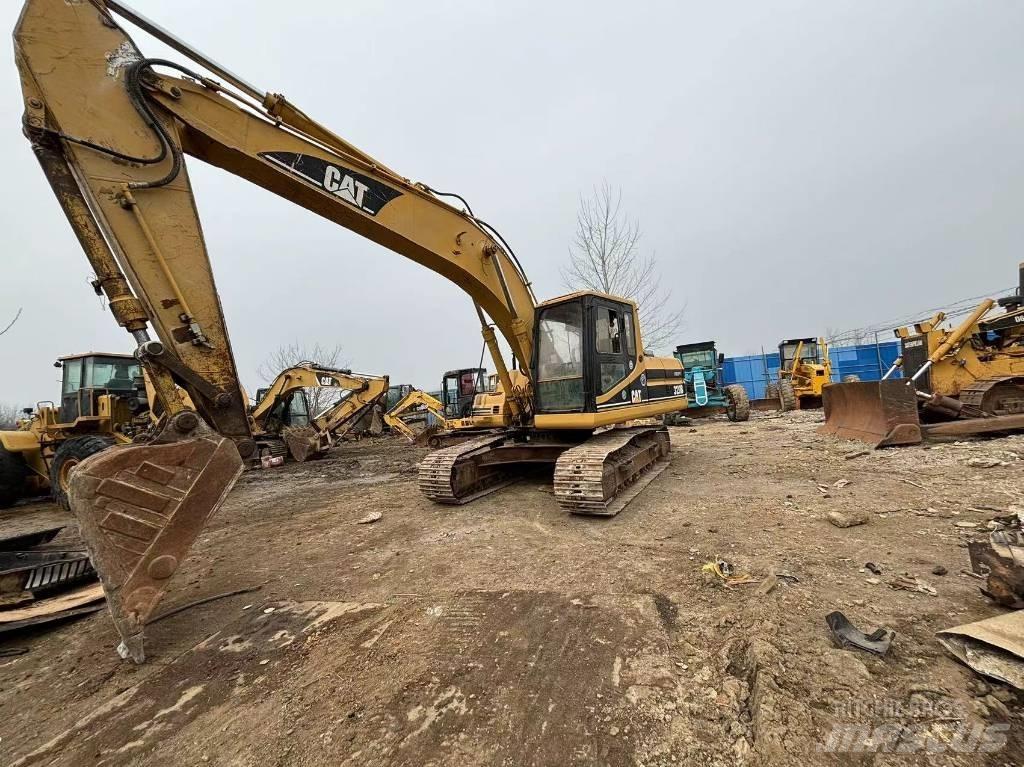 CAT 320 B L حفارات زحافة