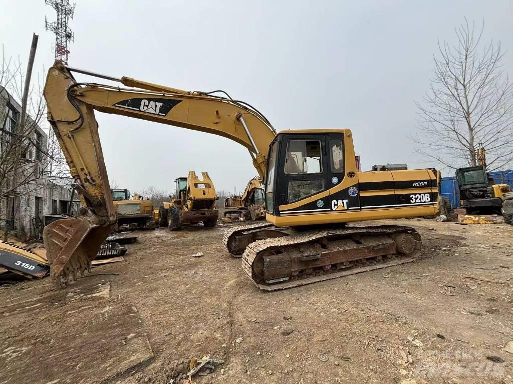 CAT 320 B L حفارات زحافة