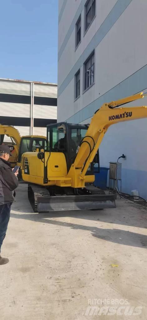 Komatsu PC 56-7 حفارات زحافة