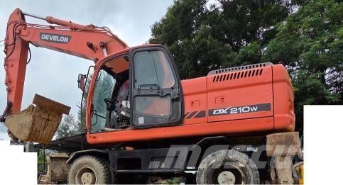 Doosan DX 210 W حفارات بعجل