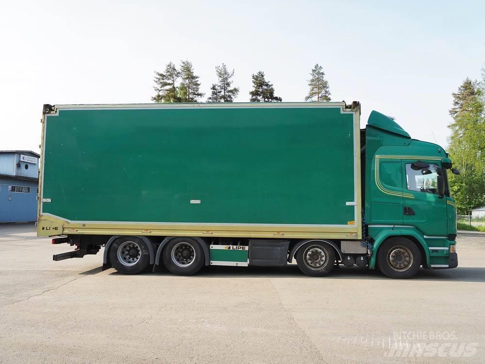 Scania R 730 شاحنات نقل ألواح الخشب