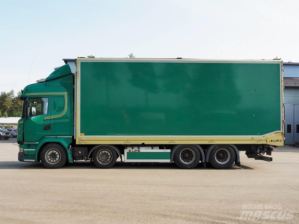 Scania R 730 شاحنات نقل ألواح الخشب