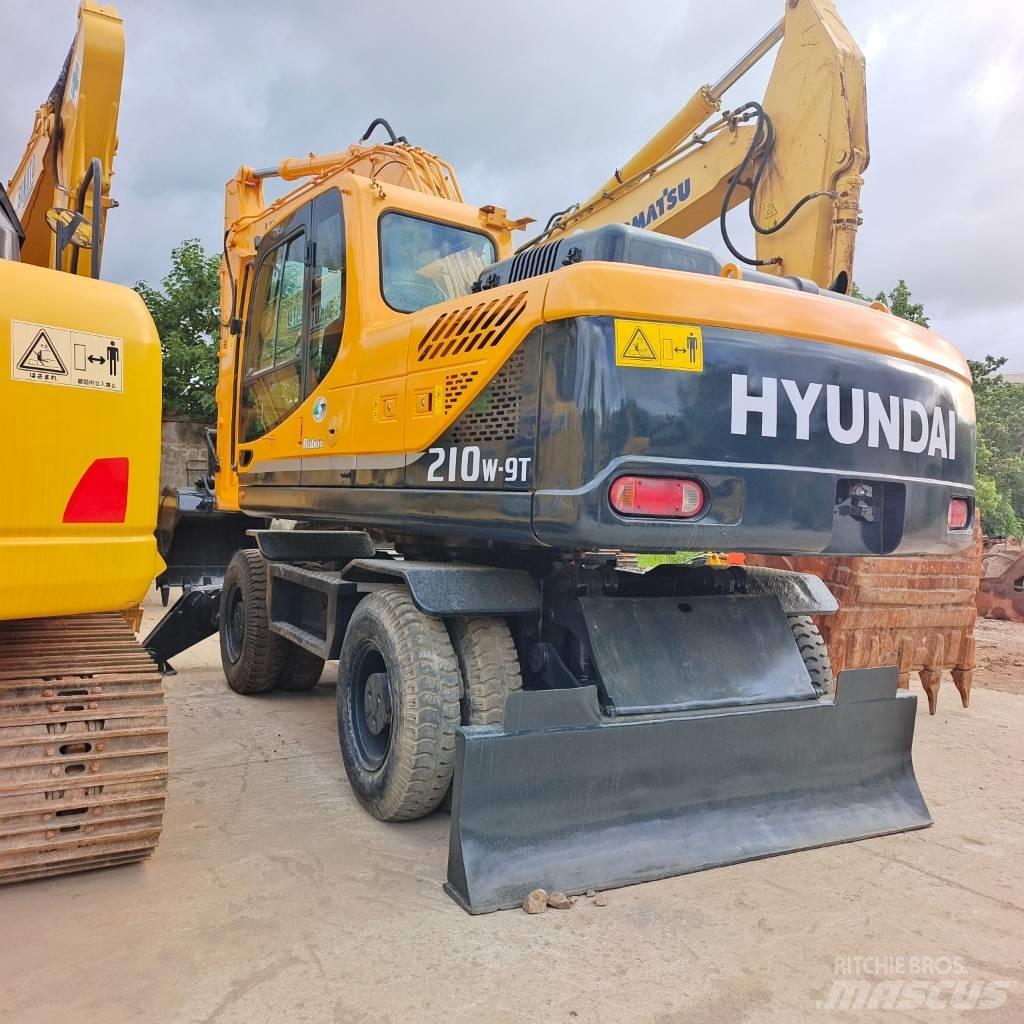 Hyundai 210W-9 حفارات بعجل