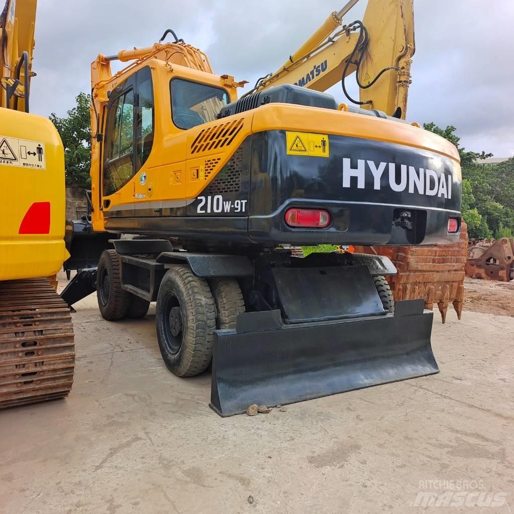 Hyundai 210W-9 حفارات بعجل