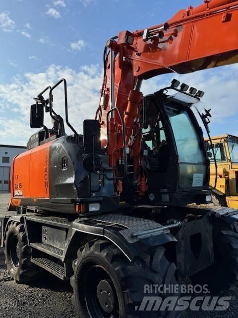 Hitachi ZX 140 W-6 حفارات بعجل