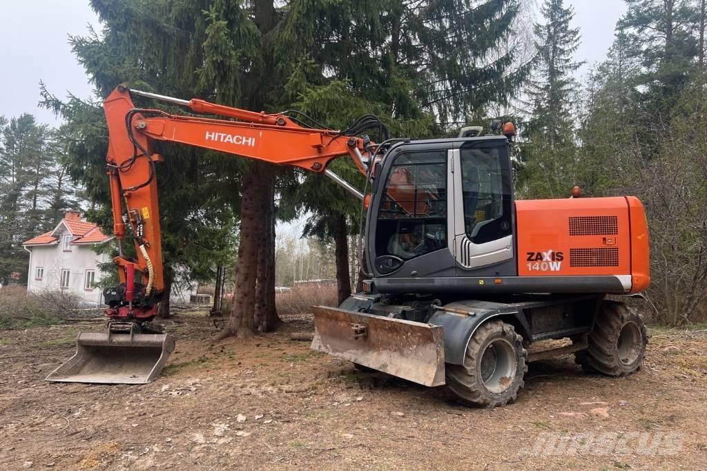 Hitachi ZX 140 W-3 حفارات بعجل