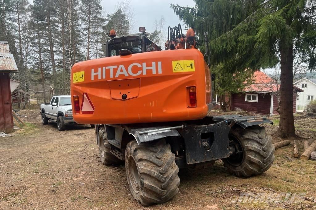 Hitachi ZX 140 W-3 حفارات بعجل