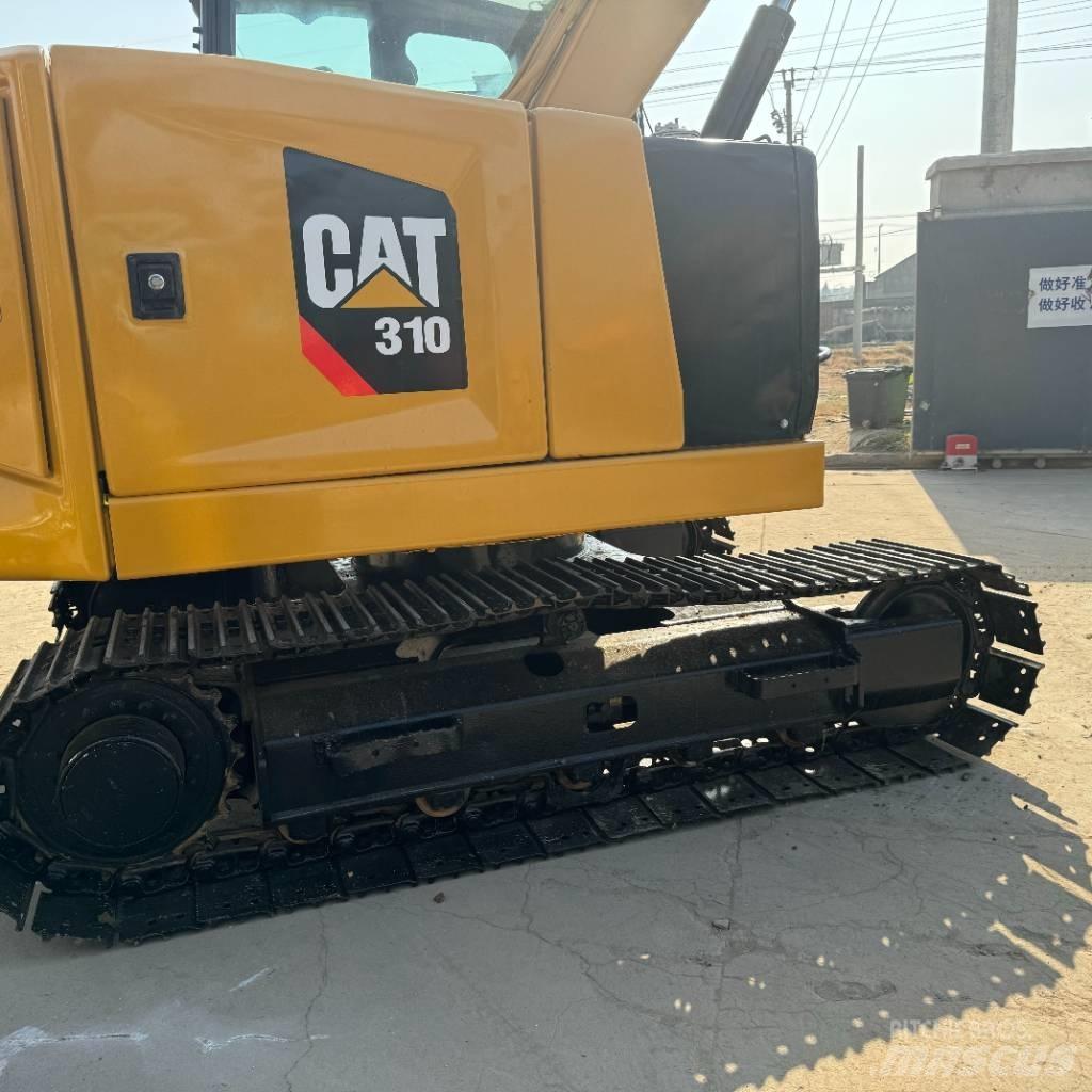 CAT 310 حفارات زحافة