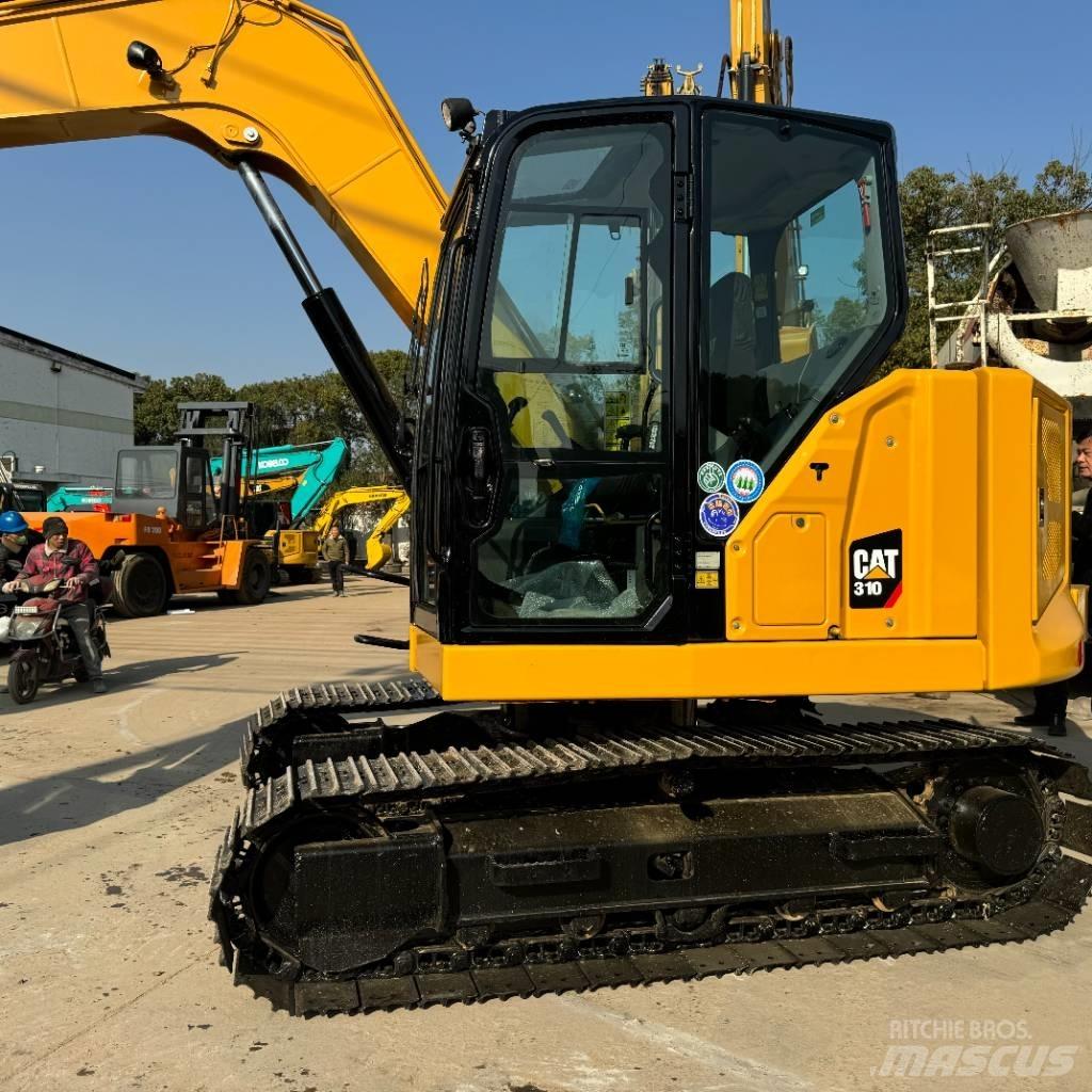 CAT 310 حفارات زحافة