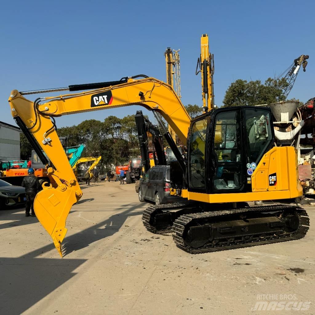 CAT 310 حفارات زحافة