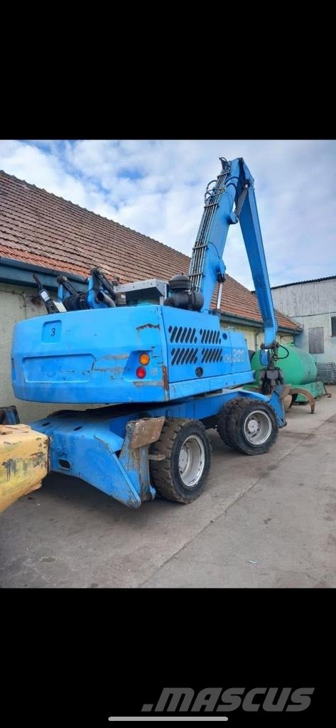 Fuchs MHL 320 حفارات بعجل