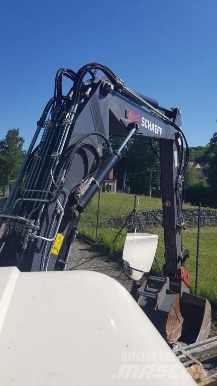 Schaeff TW 110 حفارات بعجل