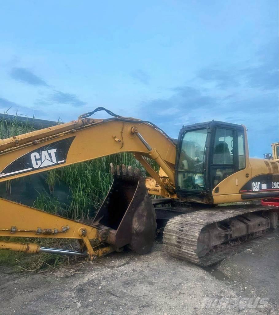 CAT 320 C L حفارات زحافة
