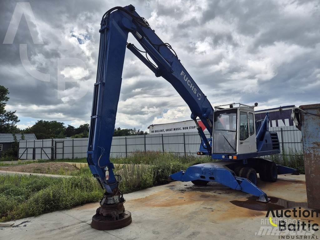 Fuchs MHL 331 حفارات بعجل