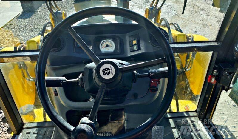 New Holland B 115 لوادر ذات جرافات عكسية