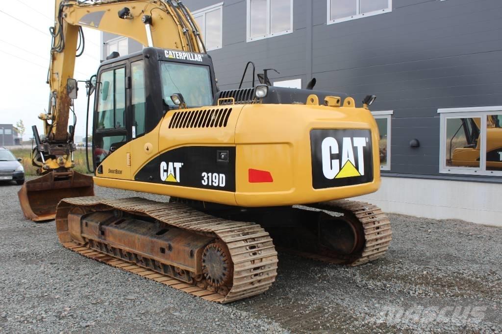 CAT 319 D L حفارات زحافة