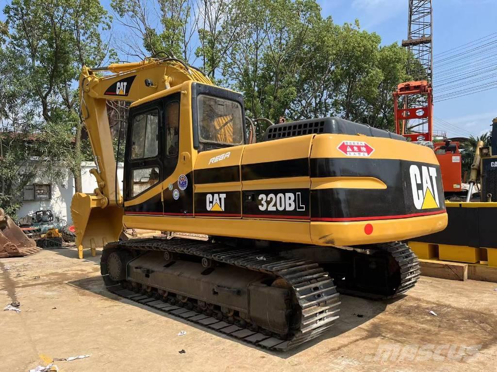 CAT 320 B L حفارات زحافة