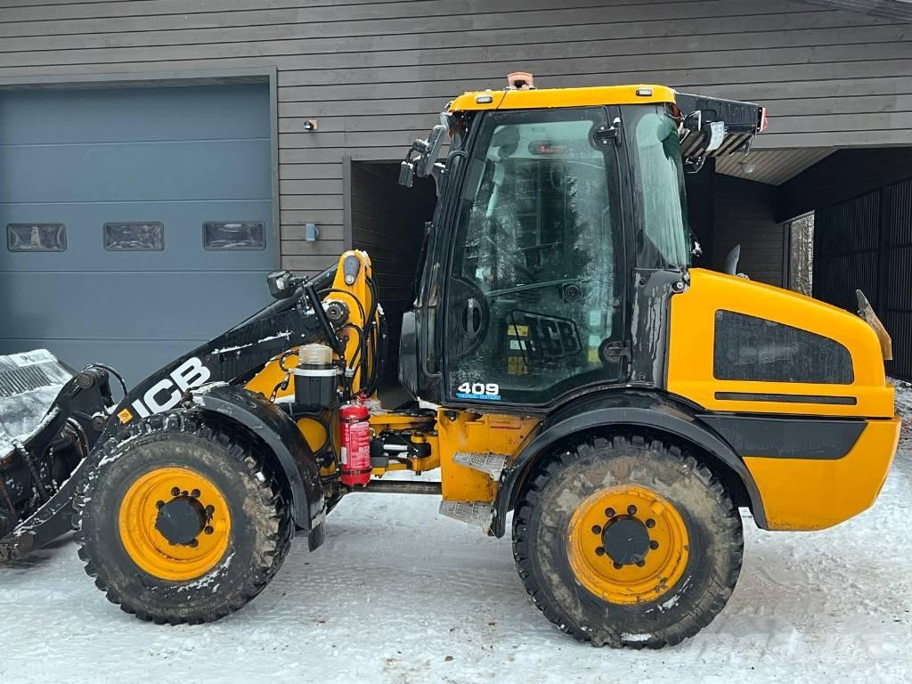 JCB 409 لوادر بعجل