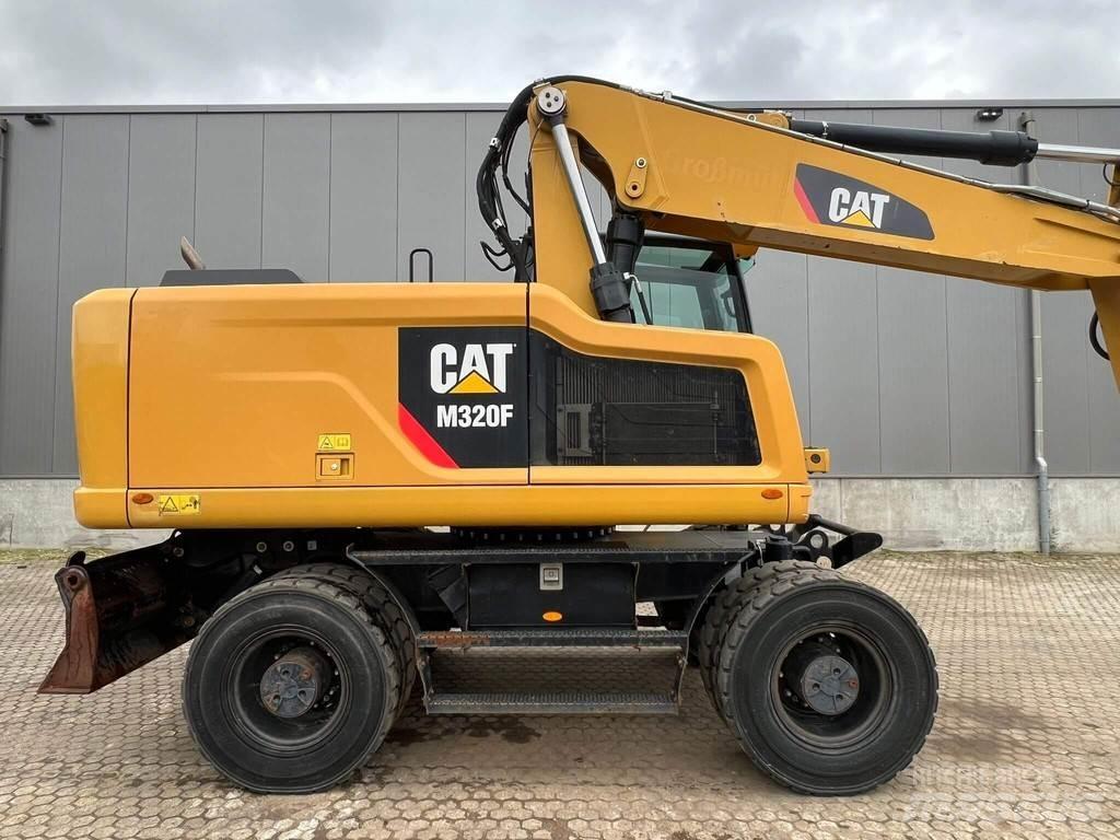 CAT M320F حفارات بعجل