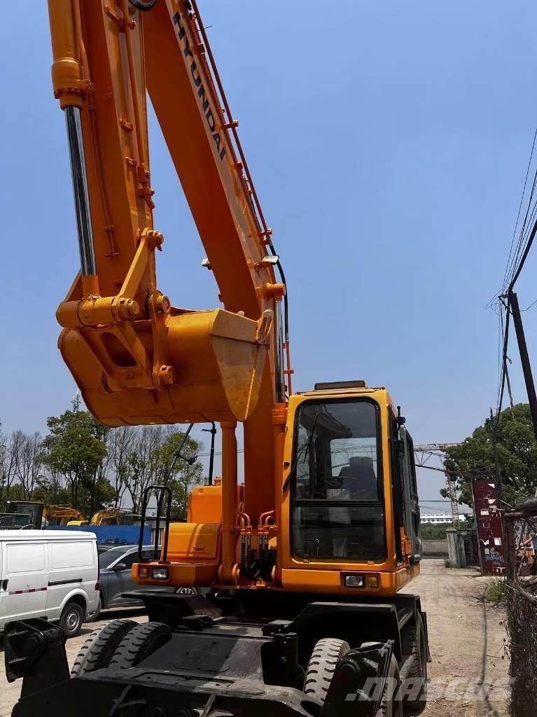 Hyundai 210W-7 حفارات بعجل