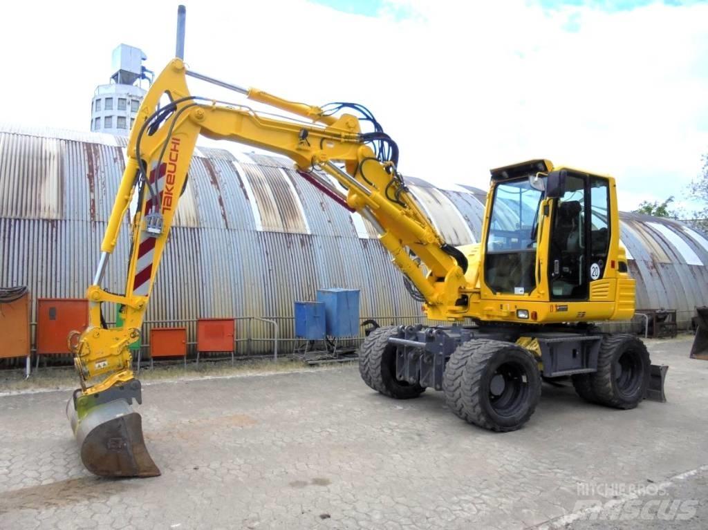 Takeuchi TB 295 W-2 حفارات بعجل