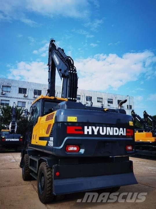 Hyundai 210 W-9 حفارات بعجل