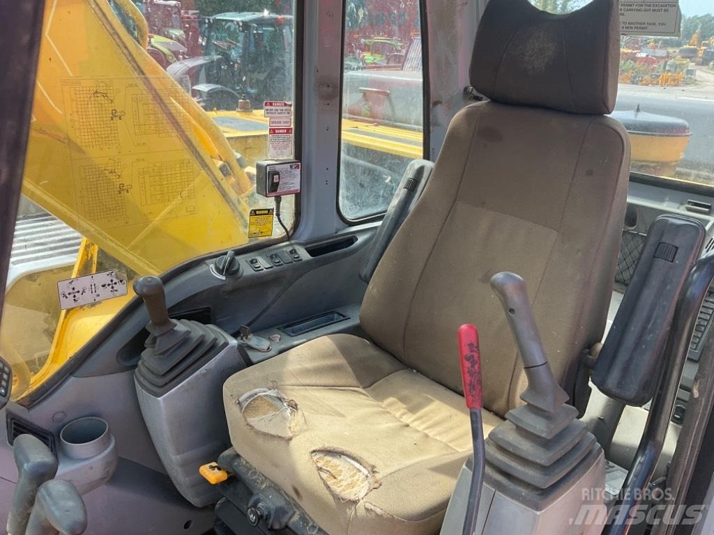 New Holland E 305 حفارات زحافة