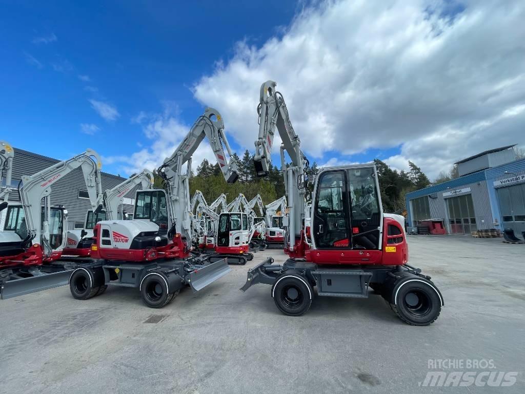 Takeuchi TB 370W حفارات بعجل