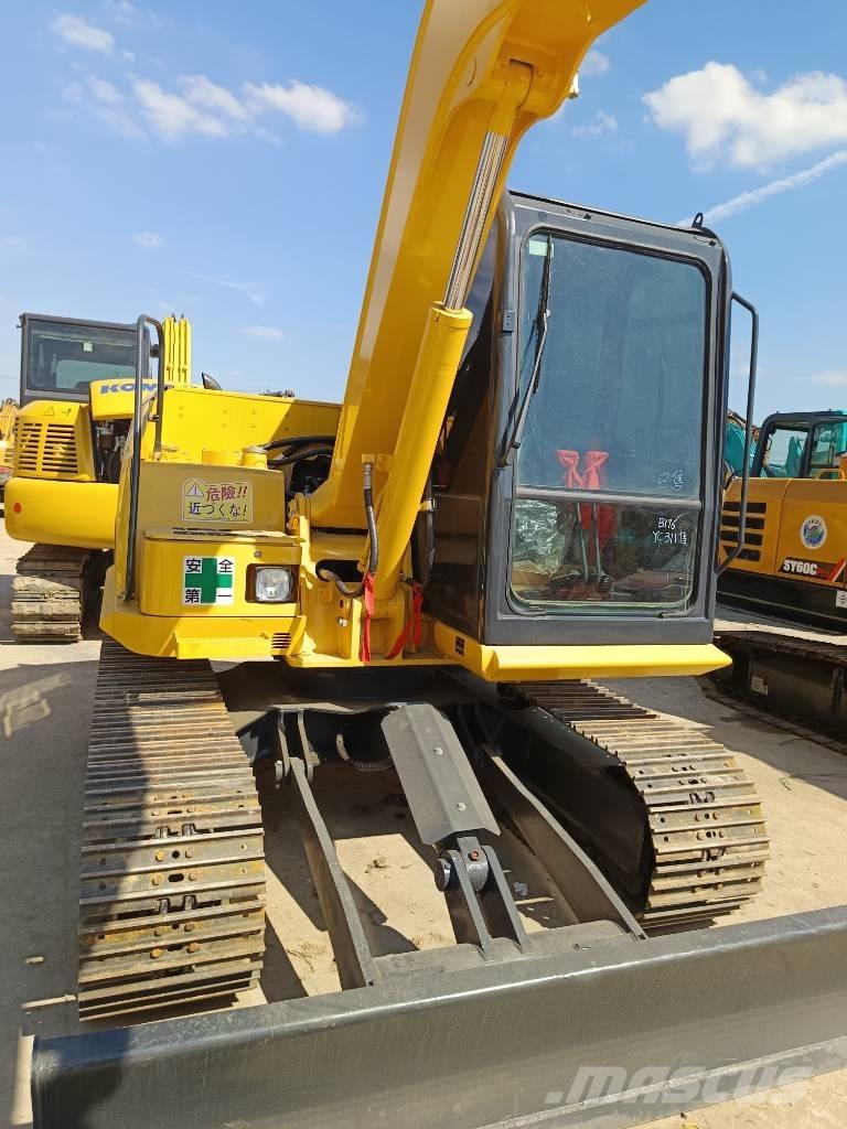 Komatsu PC 70 حفارات زحافة