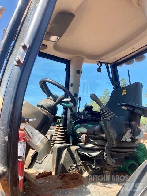 JCB 4 CX لوادر ذات جرافات عكسية