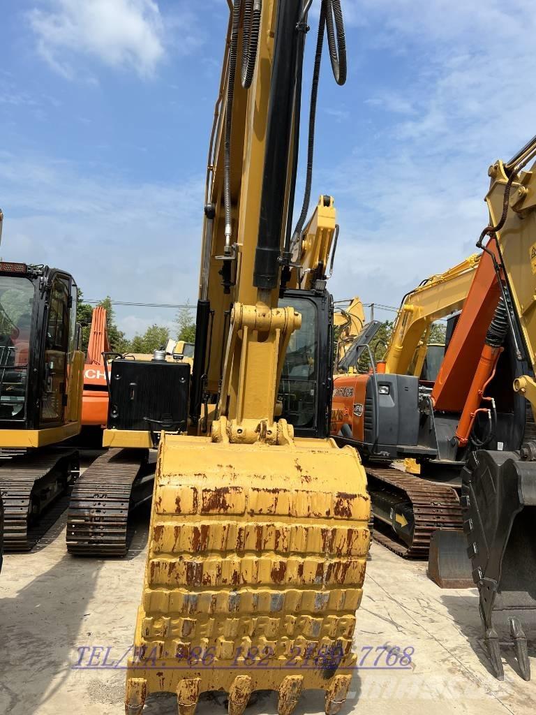 CAT 310 حفارات زحافة
