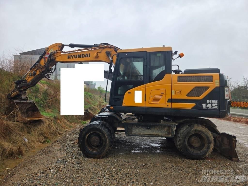Hyundai HW 145 حفارات بعجل