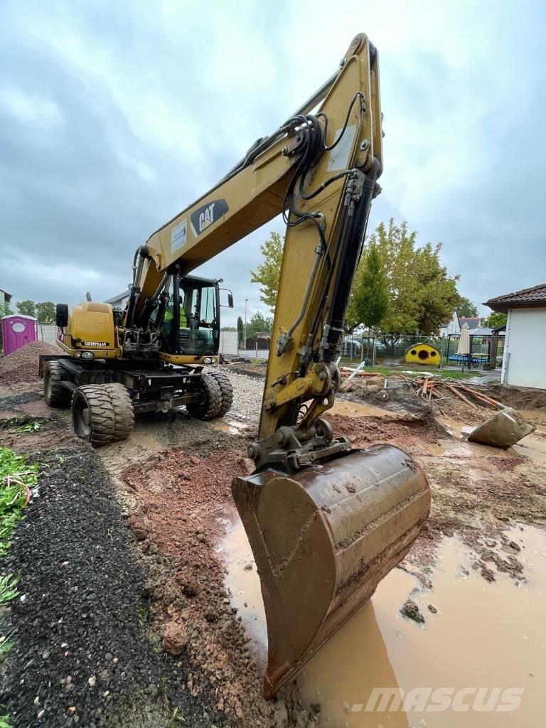 CAT 316 D حفارات بعجل