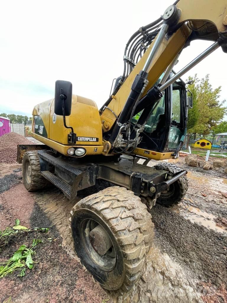 CAT 316 D حفارات بعجل